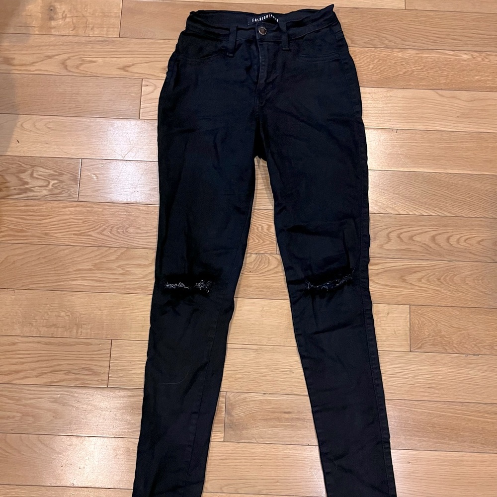Fashion Nova black high waisted skinny pants with rips